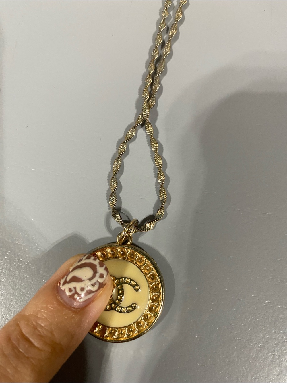 Gold-Tone Round Pendant Necklace with Cream Center
